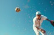 © Deivison - Baseball ball being thrown by pitcher, blurred background, sport, leisure concept.