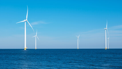 A majestic row of wind turbines rises from the ocean in the Netherlands Flevoland, harnessing the power of the wind to generate clean energy