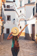 Female tourist visiting white village in Andalusia- Spain