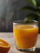 glass of fresh orange juice and oranges