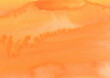 紙の質感のある柔らかオレンジの水彩の背景素材
