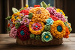 Beautiful vivid colorful knitted flowers made yarn in a wicker basket on wooden table in home room. Wool floral decoration close-up.