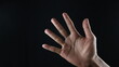 © Aufa Fahmi  - Male hand gesture number five closeup isolated on a black background