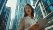 © Studio Nova - A Businesswoman with a Tablet Downtown