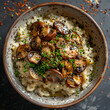 A plate of mushroom risotto garnished with chives on a table