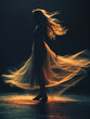 A dancer’s silhouette in motion, draped in a flowing dress, is captured against a dark backdrop, highlighted by a golden glow that creates an ethereal and captivating visual