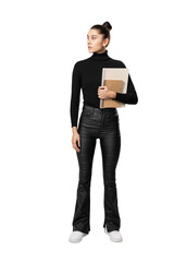 Wall Mural - A woman standing with a notebook, wearing a black turtleneck and leather pants, against a white background, model pose concept