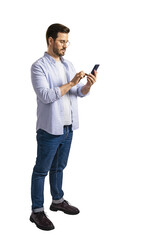 Fototapete - A man using a smartphone, standing isolated on a white background, showcasing a technology concept