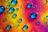Fototapeta Kwiaty - Bright abstract colorful liquid background with drops and bubbles