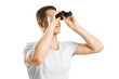 © Who is Danny - A man looking through binoculars, isolated on a white background, depicting the concept of observation or search