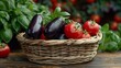 Wicker basket with eggplant, tomatoes and basil on a wooden platform