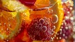 © Justlight - A closeup of a glass of sangria showing off the citrus fruits and floating bubbles.