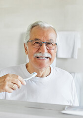 Wall Mural - man tooth bathroom toothbrush hygiene senior morning routine brushing toothpaste care dental elderly