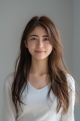 Wall Mural - Japanese Woman With Long Hair in White Shirt