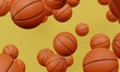 Basketballs falling on a yellow background. 3d rendering