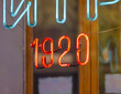 Very Old Vintage Nineteen Twenty Numbers Neon Sign in Shop Window