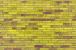 Texture of an old yellow brick wall. Abstract construction background.