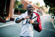 © Geber86 - Active man with gym bag drinking water after workout