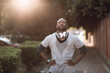 © Geber86 - Man with headphones resting after street run