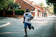 © Geber86 - Active young black man jogging on the street