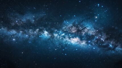 Wall Mural - the image showcases an impressive view of the cosmos with deep blue tones and dense star clusters