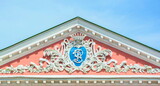 Fototapeta Las - The monogram of the Counts Sheremetevs on the pediment of the mansion