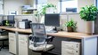 © Matthew - A cozy office cubicle setup with plants, computer monitor, and ergonomic chair showcasing a balanced work environment