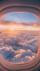 Wall Mural - view of sky from airplane window with sunset in background