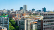 Cityscape of the city of Madrid in a drone view with residential and office buildings, Spain.