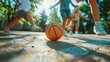© JM_GUERRERO - A group of children playing basketball on a court