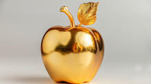 A Golden Apple With A Shiny Surface And A Golden Leaf Attached To Its Stem. The Main Subject Is A Highly Reflective And Polished Apple