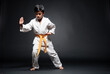 Latin karate boy in fighting position.