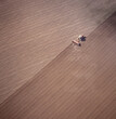  Aerial view of a tractor ploughing a paddock in western New South Wales,Australia.