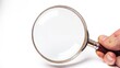 © Hammam - hand hold magnifying glass, isolated white background