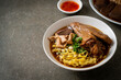 egg noodles with stewed and braised duck in brown soup