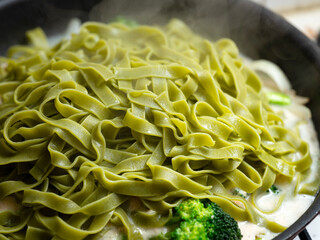 Wall Mural - Spinach Cream Pasta in Iron Pan