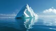 An icebergs tip and submerged section glisten in the sunlit North Sea. copy space for text.