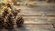 Pine cones on wooden background