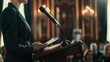 Close-up of unrecognizable female politician in rings standing at rostrum with microphones and clipboard while addressing conference