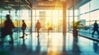 © Stefan - long exposure shot of a crowd of business people walking in a bright office lobby, fast-moving with blurriness.