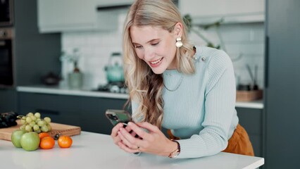 Canvas Print - Woman, smartphone and smile with laugh in kitchen with funny picture or selfie for social media. House, streaming and online with relax on weekend with positive or video call with chatting in Canada.