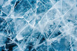 Close-up on the crystalline structure of ice on a frozen lake, highlighting the intricate patterns formed by nature 