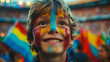 Joyful Young Fan with Painted Face Cheering at a Crowded Soccer Stadium