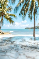 Wall Mural - Beautiful marble table top with a blurred beach and palm trees background for product display montage
