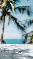 Wall Mural - Beautiful marble table top with a blurred beach and palm trees background for product display montage
