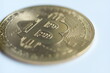 bitcoin golden coin macro close up logo on white background 