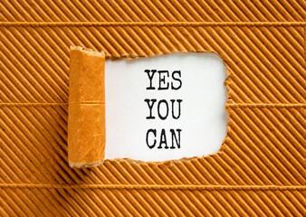 Wall Mural - Motivational and Yes you can symbol. Concept words Yes you can on beautiful white paper. Beautiful brown paper background. Business motivational and Yes you can concept. Copy space.