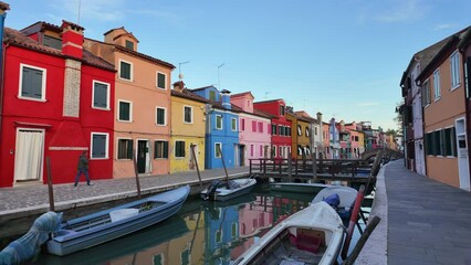 Wall Mural - Boats on the sides of a canal near the colourful houses of Burano Island, Italy