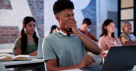 Poster - Student, laptop and tired with people in class for online, learning and diversity in university or college. African man, tech and typing for education in fatigue, exhausted and burnout at school