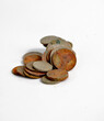 A pile of tarnished and partially corroded coins